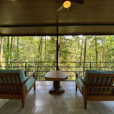 charming terrace with sweeping views of the tranquil outdoors.