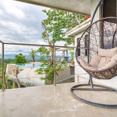 calming space to appreciate the outdoors, surrounded by lush greenery and fresh air.