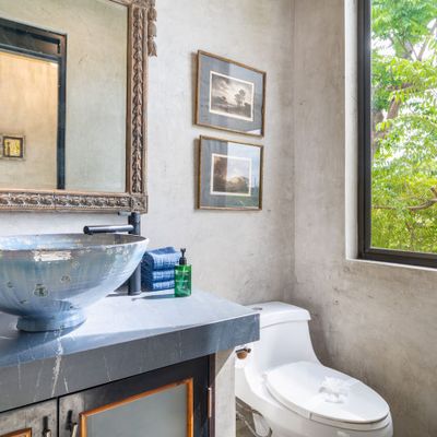 Half-bathroom off of the common area.