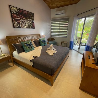 Owner's Suite has a king-size bed, 42-inch SmartTV, A/C, access to the patio and the pool and en-suite bathroom.