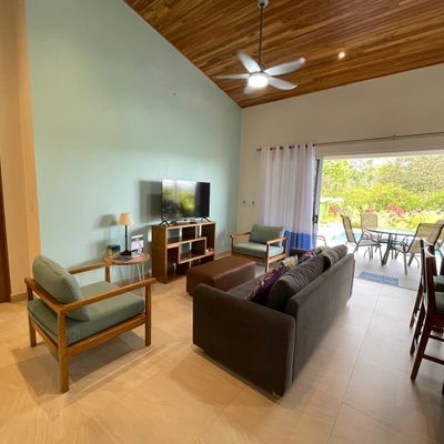 Enjoy a beautiful moment in family at the living room with a 50-inch SmartTV.