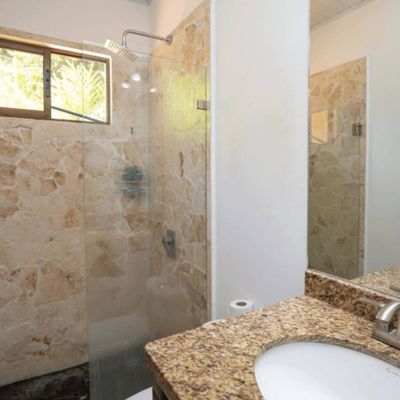 stylish bathroom featuring creative touches and bold, unconventional decor.
