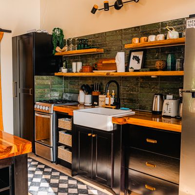 A refined kitchen with a blend of classic design and modern functionality.