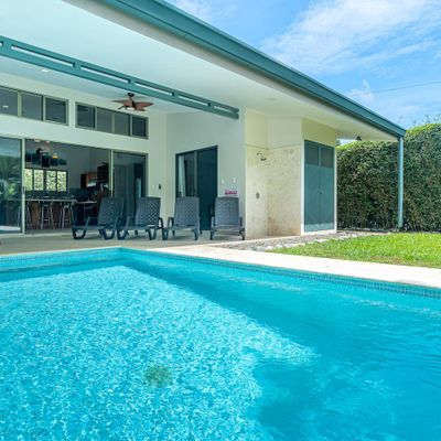 Private pool. Three bedrooms. Walk to the beach.