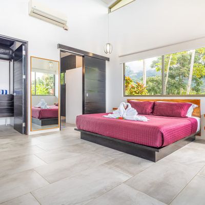 Suite #1 has ocean views, mountain views, access to the private pool, along with en-suite bathroom, air conditioning and ceiling fan.