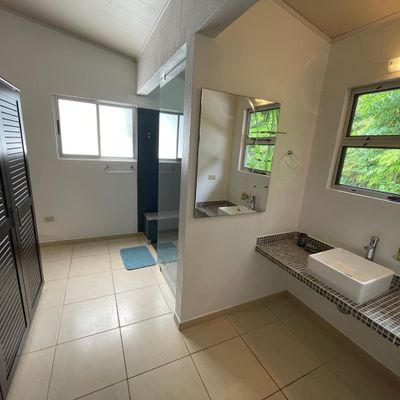 Owner's Suite has king-size bed, en suite bathroom, private balcony.