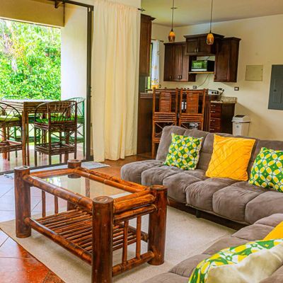spacious living room with plenty of natural light, making it feel open, airy, and welcoming