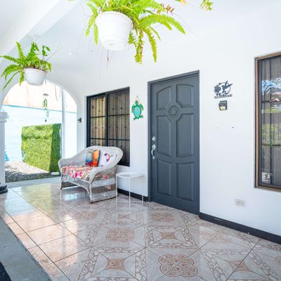 Enjoy the breezes year-round from the covered front porch.