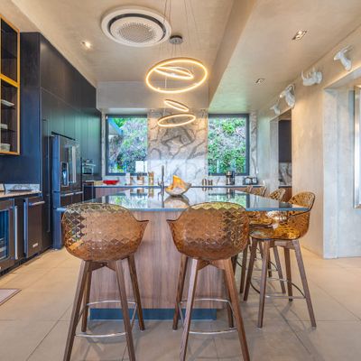 A beautifully designed kitchen that seamlessly blends modern elegance with top-tier functionality.