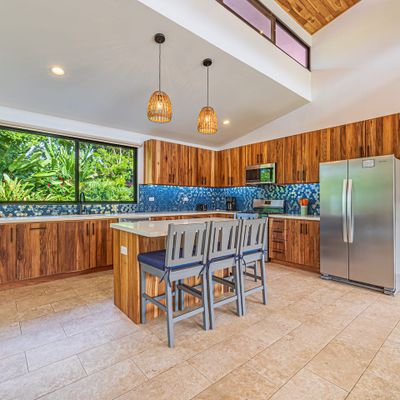 wide, well-equipped kitchen with modern features