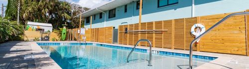 Beachfront escape w/ pool, grill & balconies
