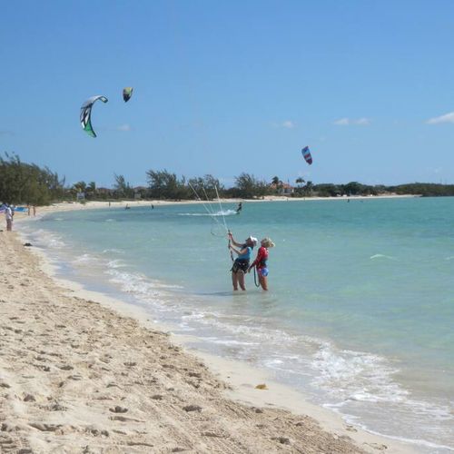 Take kiteboarding lessons (5 min. away)