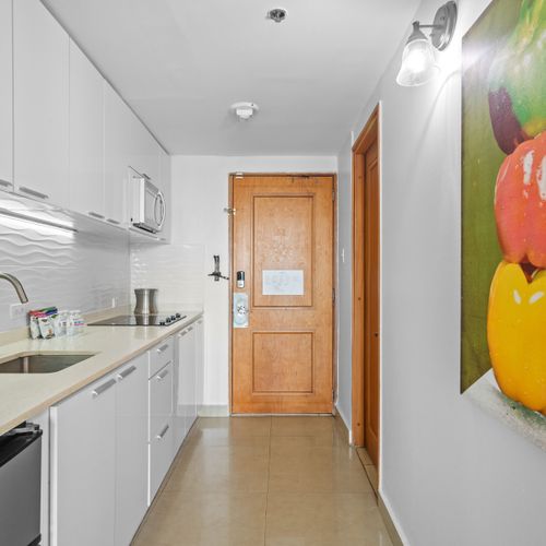 Enjoy the convenience of home-cooked meals with all the essential kitchenware provided for your culinary adventures.