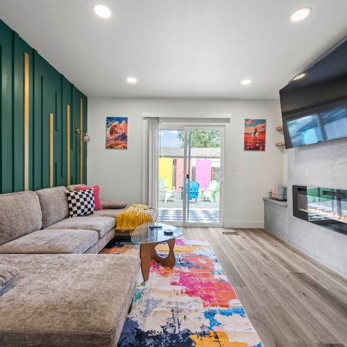 Bright living room flows seamlessly to the backyard—perfect for indoor-outdoor fun and relaxation.