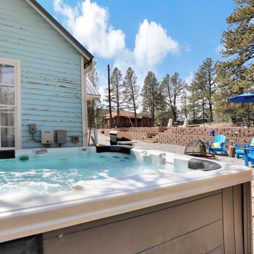 Hot tub ready for a soothing soak amid the pines.