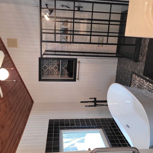 Bathroom #2 (second floor):  large and gorgeous bathroom with a soaking tub, walk-in shower, ceiling fan, mirror, vanity, sink, and a toilet with a bidet.