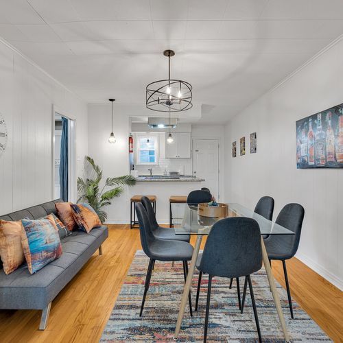 Relax in style! This bright and inviting living space offers the perfect spot to unwind after a day of exploring New Orleans. Modern comforts meet local charm in this serene retreat