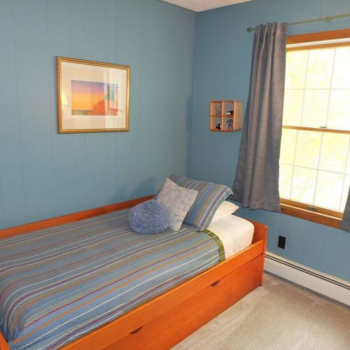 Bedroom #3:  features a trundle (i. E. 2 twin beds), a dresser, and a closet.