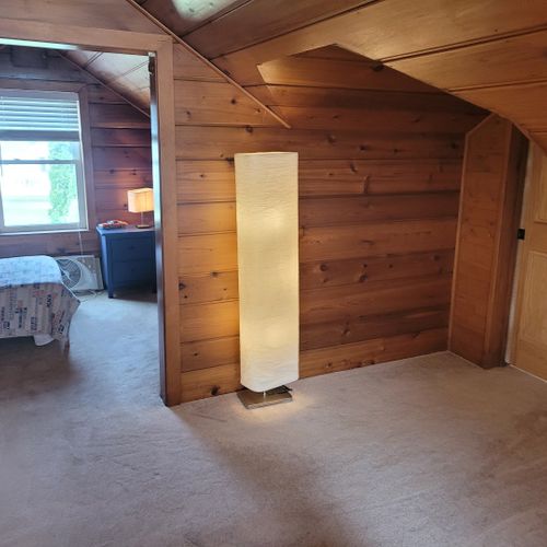 Bedroom #4 (larger hosue, second floor):  this is a large private area with its own sectional sofa, television, desk, and two twin beds.