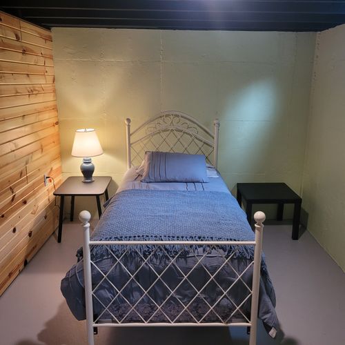 BASEMENT:  There is a twin bed set up in the basement for additional sleeping capacity.