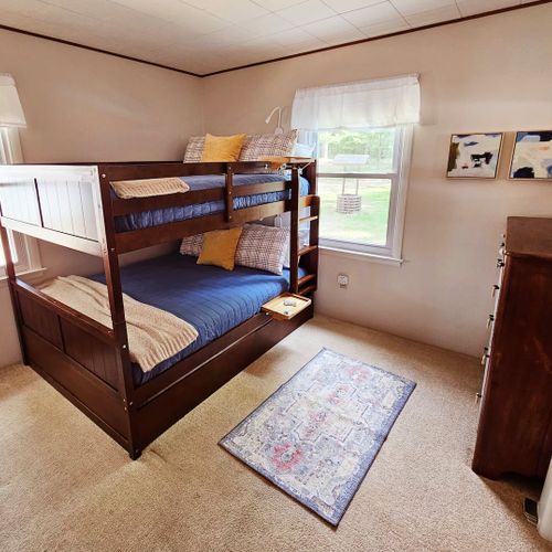 Bedroom #2:  features a twin-on-full bunk bed, trundle bed, and a dresser.