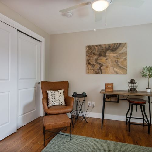 Work or relax in the private lounge area, complete with a comfortable chair and a desk for those who wfh.