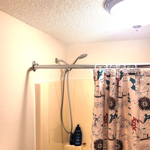 BATHROOM #2:  Full common bathroom that also has a washer and dryer in it.