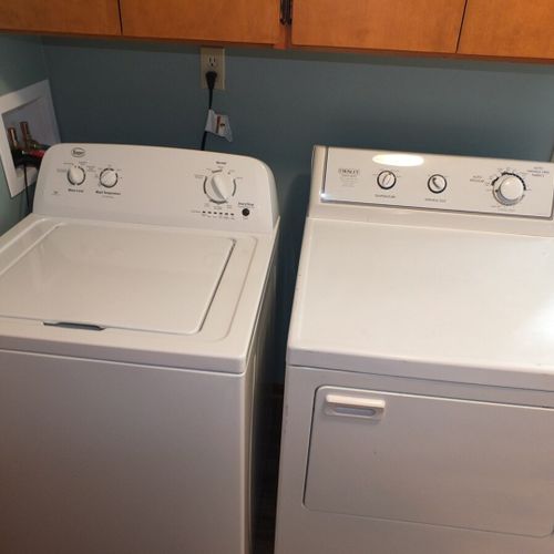 Laundry room:  convenient main floor laundry area with a washer and dryer.