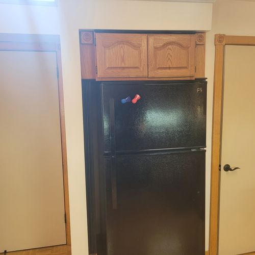 Bathrooms:  another fun design feature is that the home has 2 bathrooms right next to each other on the main floor. The entrance to each bathroom is on either side of the kitchen refrigerator.