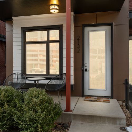 Relax on the welcoming front porch and enjoy peaceful neighborhood views and fresh air.