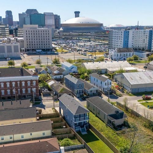 Aerial view showcasing the home & its surrounding neighborhood.