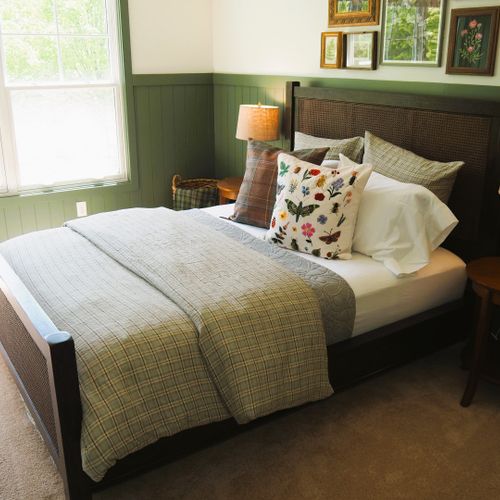Bedroom #4 (second floor):  features a queen-size bed, closet, and desk.