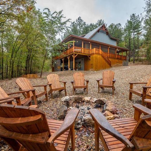 The fire pit with Adirondack chairs.