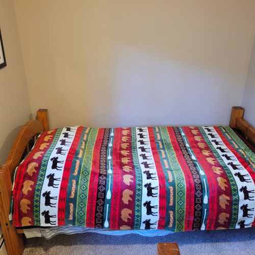 BEDROOM #4 (SECOND FLOOR):  Cute room with 2 twin beds, dresser, and a lamp.