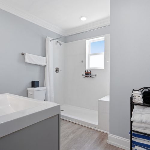 Clean, minimal bath w/ a calming, spa-like feel.
