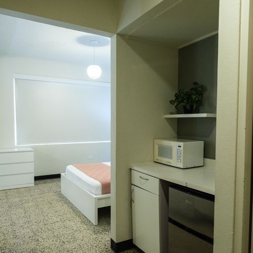 Enjoy the ease of having a microwave and mini-fridge right in your room, perfect for keeping snacks and drinks cool or warming up a quick bite.