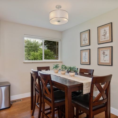 Savor every bite at the spacious dining table with seating for 6.