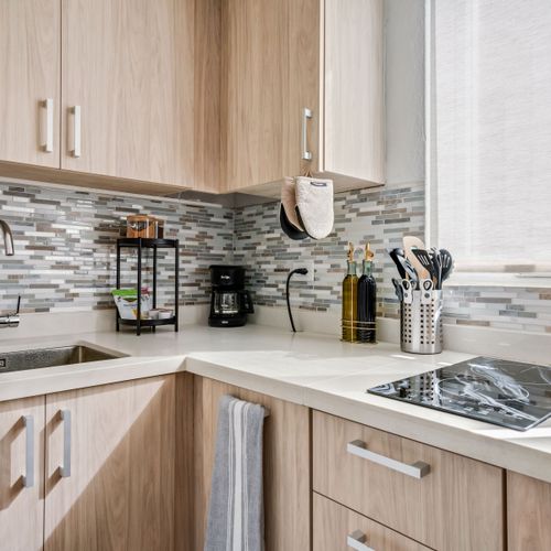 Detail-Oriented Design: Every detail in our kitchen is designed for your comfort and ease, from the neatly organized utensils to the ample prep areas, ensuring a seamless stay.