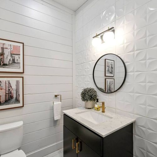 A half bath is also available for guest convenience.