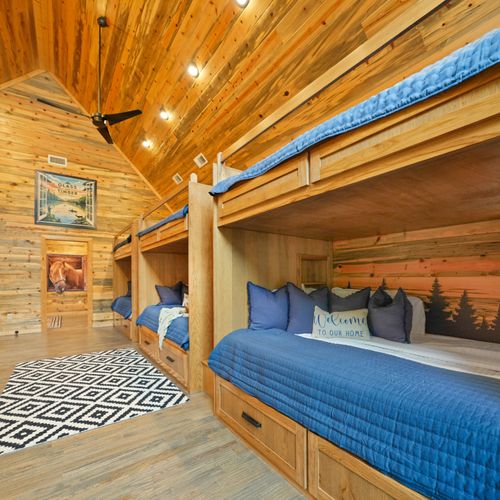 Perfect for kids—or adults who still love adventure—the bunk room redefines luxury sleepover vibes.