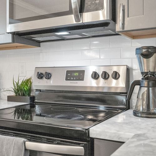 Full stove & oven ready for home-cooked meals any time of day.