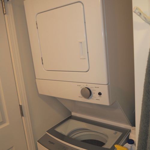Bathroom:  full bathroom with a walk-in shower as well as a stacked washer and dryer.