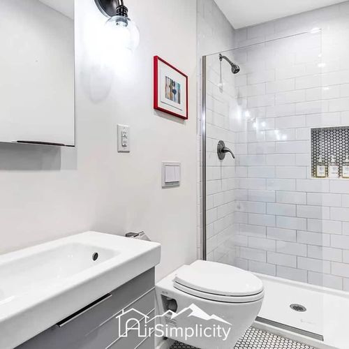 - freshen up in a sleek walk in shower with sparkling white subway tiles
- fluffy towels and boutique toiletries add a spa like touch to your stay
- clean lines, bright lighting, and thoughtful touches create a polished retreat