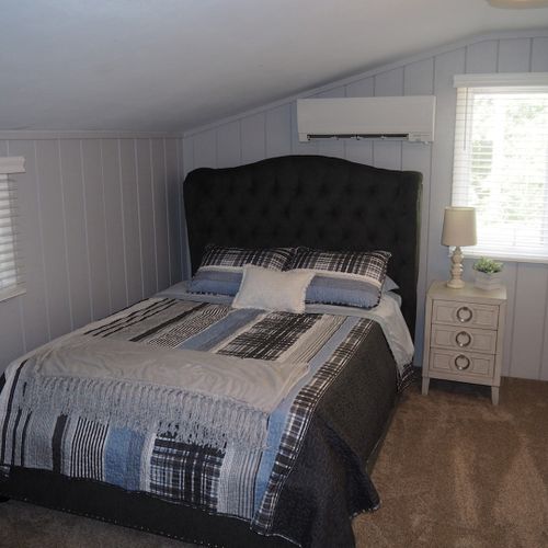Bedroom #3 (second floor):  cute little bedroom with a full-size bed and it's own private a/c unit.