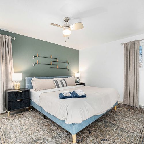 - sink into this dreamy king size bed and wake up refreshed for new adventures
- earthy tones and designer accents create the perfect modern retreat vibe
- let morning light pour in or sleep in with full privacy from dual curtained windows
