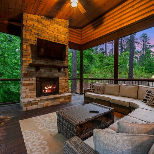 Oversized outdoor sectional around the gas fireplace.