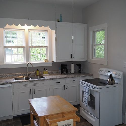 Kitchen:  the home has a huge kitchen that is complete with all modern appliances, including a dishwasher. A good supply of cooking and dining utensils are included as well.