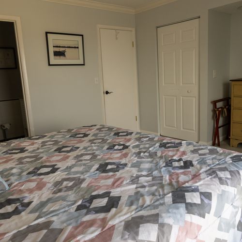 Enjoy the convenience of an attached bathroom and tv in the main bedroom for added privacy.