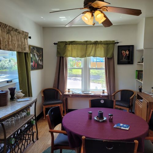 Dining room:  the home has a lovely dining room with a dining table, seating for 6 adults, and a wine bar.
