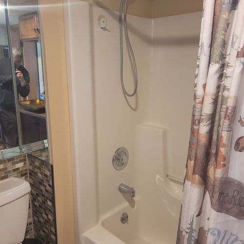 Bathroom #1 (main floor):  full bathroom with a combination tub and shower and a large bathroom counter.